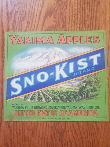Snokist Green next to latest version Fruit Crate Label